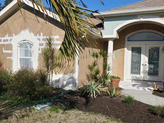Stucco home prepped and repainted in Southwest Florida