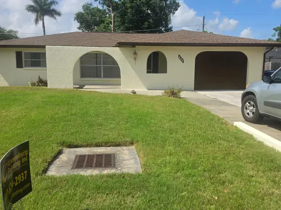 Freshly painted single-story home exterior in Marco Island, FL