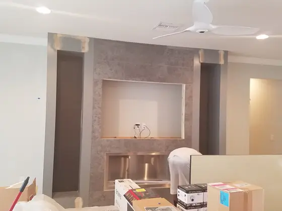 Custom-painted built-in wall unit in a Florida home
